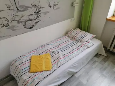 Łóżko lub łóżka w pokoju w obiekcie CityCenter NOWY ŚWIAT studio