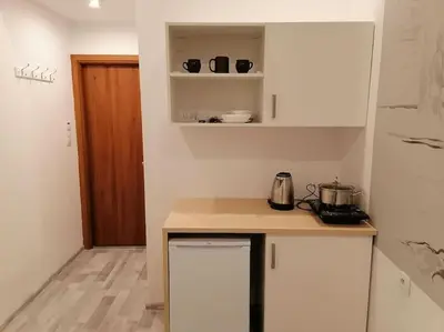 Kuchnia lub aneks kuchenny w obiekcie CityCenter NOWY ŚWIAT studio