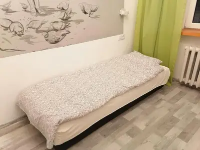 Łóżko lub łóżka w pokoju w obiekcie CityCenter NOWY ŚWIAT studio