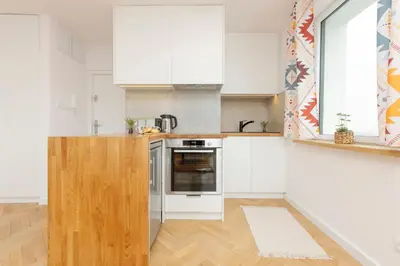 Kuchnia lub aneks kuchenny w obiekcie Stylish Studio located near PGE Narodowy by Noclegi Renters