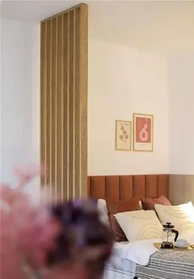 Łóżko lub łóżka w pokoju w obiekcie Dubois Cozy Studio near Arkadia