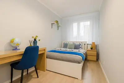 Łóżko lub łóżka w pokoju w obiekcie Walerego Sławka 3 SuperApart Ursus, blisko Factory