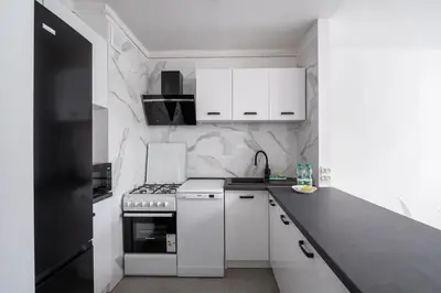 Kuchnia lub aneks kuchenny w obiekcie Wierzbno Modern Apartment by BookingHost