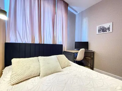 Łóżko lub łóżka w pokoju w obiekcie Superior Wlodarzewska, 2 rooms, 1 bedroom, Parking! 24h reception! Air Condition!