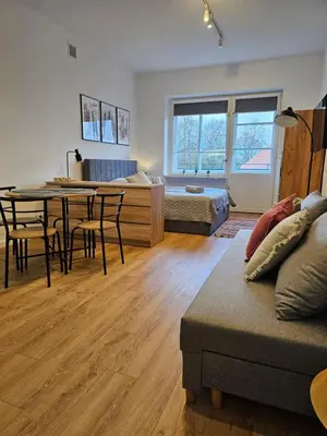 Łóżko lub łóżka w pokoju w obiekcie Apartamenty Park Powiśle