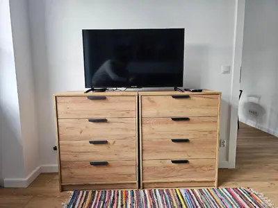 Telewizja i/lub zestaw kina domowego w obiekcie Apartamenty Park Powiśle