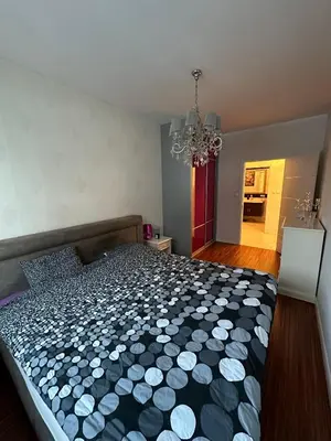 Łóżko lub łóżka w pokoju w obiekcie Apartment National Stadium Port Praski