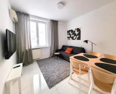 Telewizja i/lub zestaw kina domowego w obiekcie Warsaw Concierge Hoża Corner