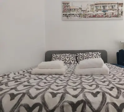 Łóżko lub łóżka w pokoju w obiekcie Życzliwy Apartament z garażem