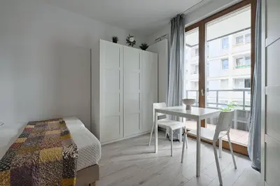 Łóżko lub łóżka w pokoju w obiekcie Urbannestgroup - Old town studio S27