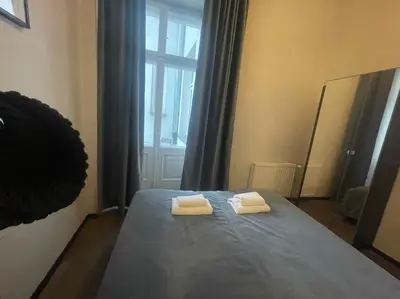 Łóżko lub łóżka w pokoju w obiekcie Nowy Świat 28