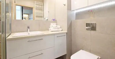 Łazienka w obiekcie City Apartments Jaktorowska