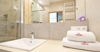 Łazienka w obiekcie City Apartments Jaktorowska
