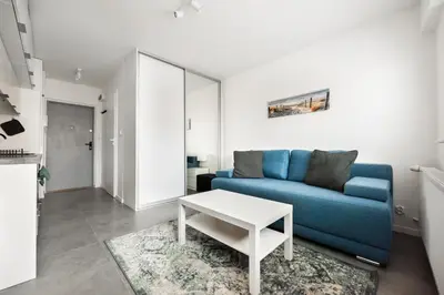 Część wypoczynkowa w obiekcie Rakowiec Blue Studio by BookingHost