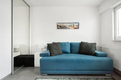 Część wypoczynkowa w obiekcie Rakowiec Blue Studio by BookingHost