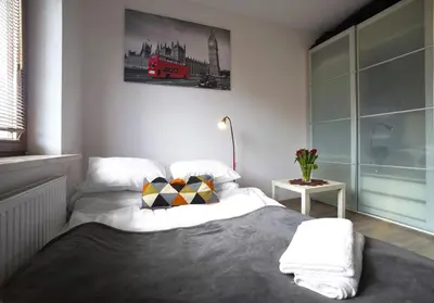 Łóżko lub łóżka w pokoju w obiekcie Apartment 1-bed Kłobucka P&O Serviced Apartments