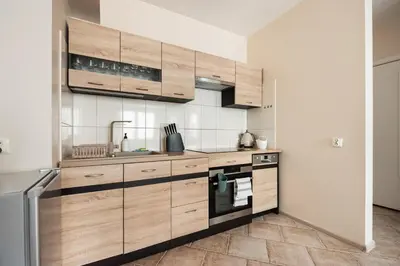 Kuchnia lub aneks kuchenny w obiekcie Praga Sulejkowska Comfort Apartment by BookingHost