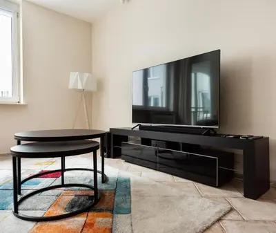 Telewizja i/lub zestaw kina domowego w obiekcie Praga Sulejkowska Comfort Apartment by BookingHost