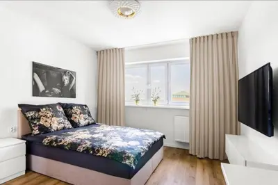 Łóżko lub łóżka w pokoju w obiekcie 20m2 Studio, near Chopin Airport, cozy and quiet