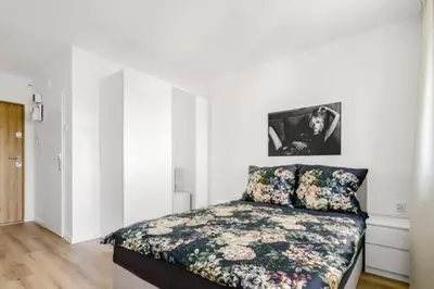 Łóżko lub łóżka w pokoju w obiekcie 20m2 Studio, near Chopin Airport, cozy and quiet