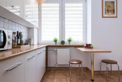 Kuchnia lub aneks kuchenny w obiekcie Modern Apartment at Classic Warsaw