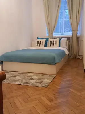 Łóżko lub łóżka w pokoju w obiekcie Apartamenty - MI Stare Miasto