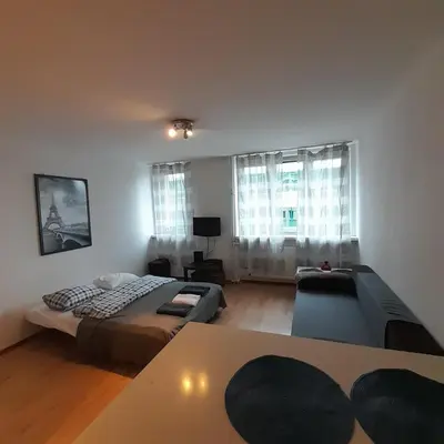 Łóżko lub łóżka w pokoju w obiekcie Central Station Apartment