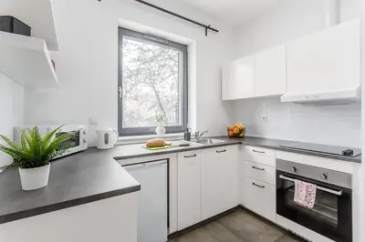 Kuchnia lub aneks kuchenny w obiekcie Warsaw City Apartments Praga