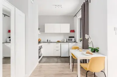 Kuchnia lub aneks kuchenny w obiekcie Warsaw City Apartments Praga