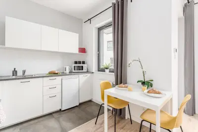 Kuchnia lub aneks kuchenny w obiekcie Warsaw City Apartments Praga