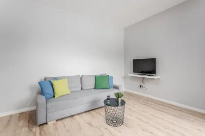 Telewizja i/lub zestaw kina domowego w obiekcie Warsaw City Apartments Praga