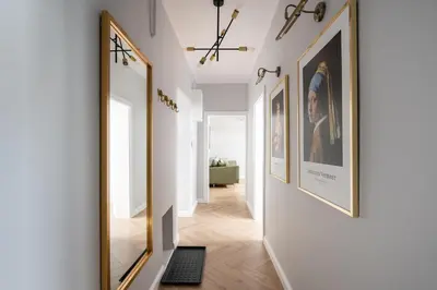 Telewizja i/lub zestaw kina domowego w obiekcie Nowy Świat 22 Luxury Apartment by BookingHost