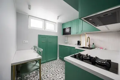 Kuchnia lub aneks kuchenny w obiekcie Nowy Świat 22 Luxury Apartment by BookingHost