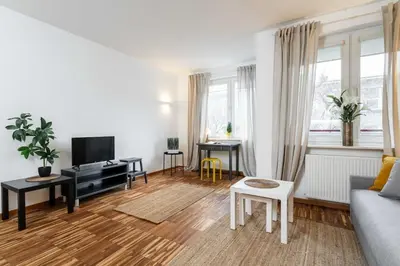 Telewizja i/lub zestaw kina domowego w obiekcie Goldenberry apartment Mokotow