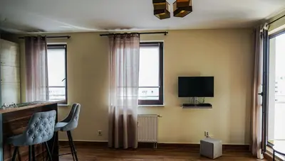 Telewizja i/lub zestaw kina domowego w obiekcie Velvet Bemowo XII