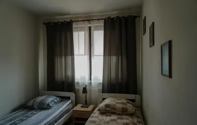 Łóżko lub łóżka w pokoju w obiekcie Velvet Bemowo XII
