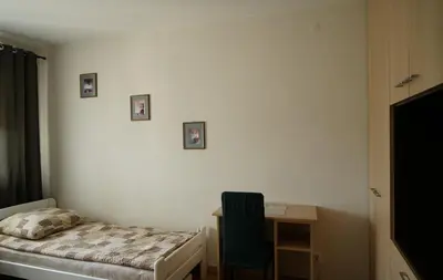 Łóżko lub łóżka w pokoju w obiekcie Velvet Bemowo XII