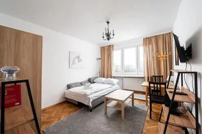 Łóżko lub łóżka w pokoju w obiekcie Wierzbno Standard Apartment by BookingHost