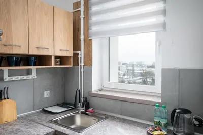 Kuchnia lub aneks kuchenny w obiekcie Wierzbno Standard Apartment by BookingHost