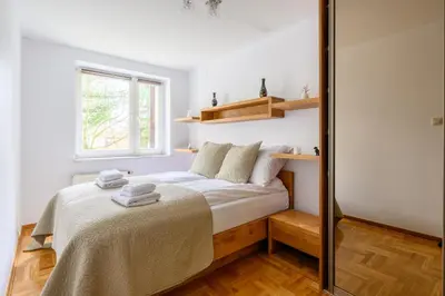 Łóżko lub łóżka w pokoju w obiekcie Bella Casa Premium Apartment - Biesiadna - Warszawa