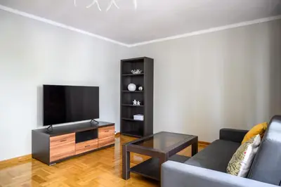Telewizja i/lub zestaw kina domowego w obiekcie Bella Casa Premium Apartment - Biesiadna - Warszawa
