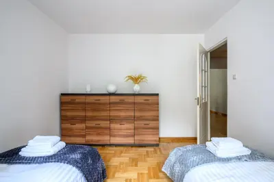 Łóżko lub łóżka w pokoju w obiekcie Bella Casa Premium Apartment - Biesiadna - Warszawa