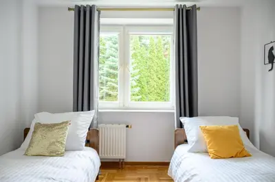 Łóżko lub łóżka w pokoju w obiekcie Bella Casa Premium Apartment - Biesiadna - Warszawa