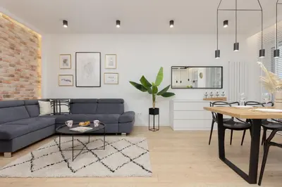 Część wypoczynkowa w obiekcie Loft Apartment with Parking in Warsaw by Noclegi Renters