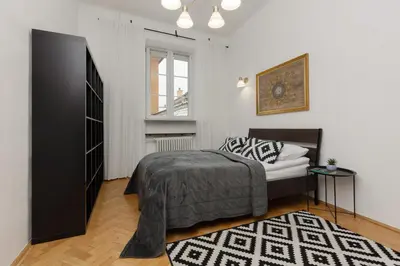 Łóżko lub łóżka w pokoju w obiekcie One Bedroom Apartment Next to the Royal Castle in Warsaw by Noclegi Renters