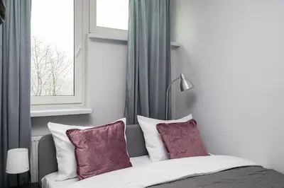 Łóżko lub łóżka w pokoju w obiekcie Metro Świętokrzyska Comfort Apartment by BookingHost