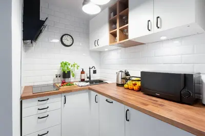 Kuchnia lub aneks kuchenny w obiekcie Graniczna 4 - B by Homeprime