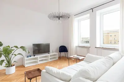 Telewizja i/lub zestaw kina domowego w obiekcie Designer Apartment in the Central Warsaw by BookingHost