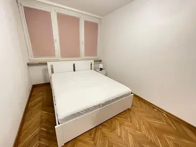Łóżko lub łóżka w pokoju w obiekcie YOURAPART Wilcza