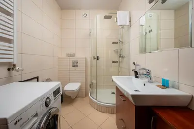 Łazienka w obiekcie Warszawa Gocławek Comfort Studio by BookingHost